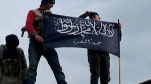 Jabhat al-Nusra fighters at Taftanaz airbase, Idlib province, in January 2013